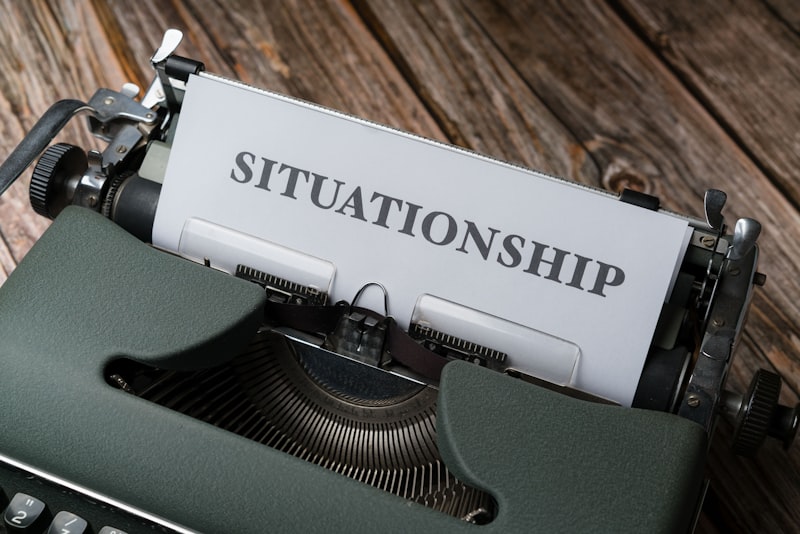 a close up of a typewriter with a sign on it