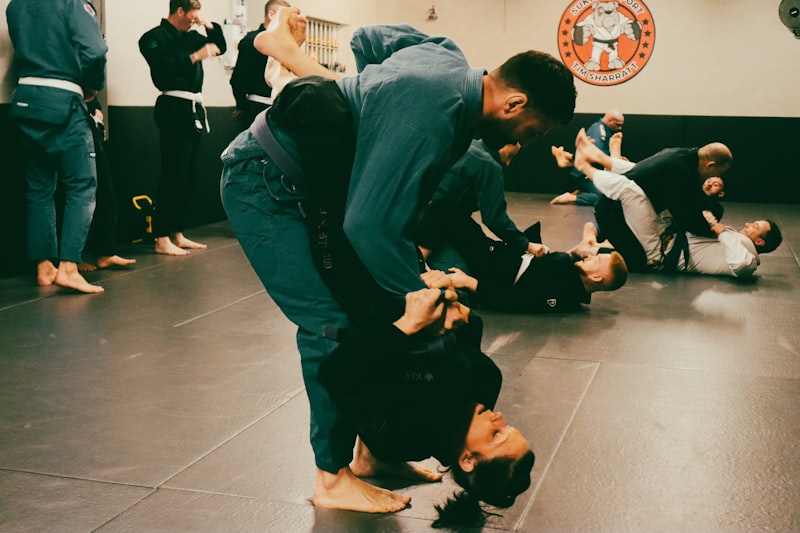 a group of people in a room doing karate