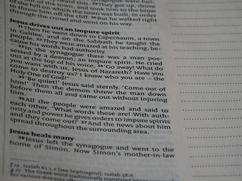 A close up of an open book with text