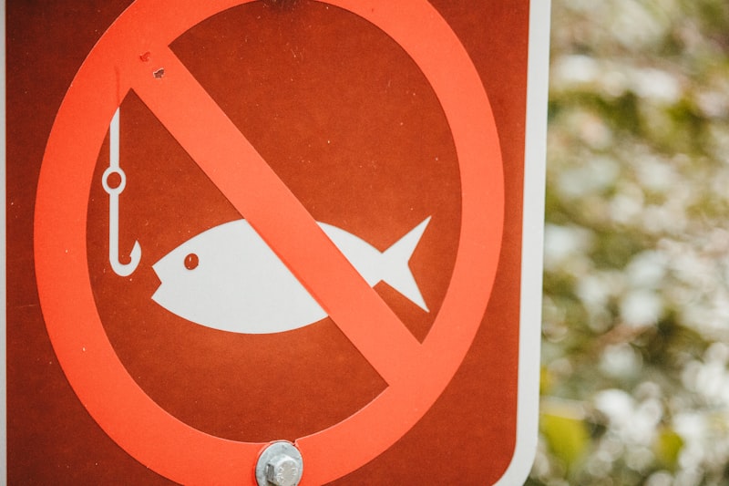 a no fishing sign with a fish in it