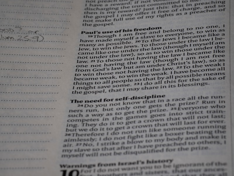 A close up of an open book with writing on it