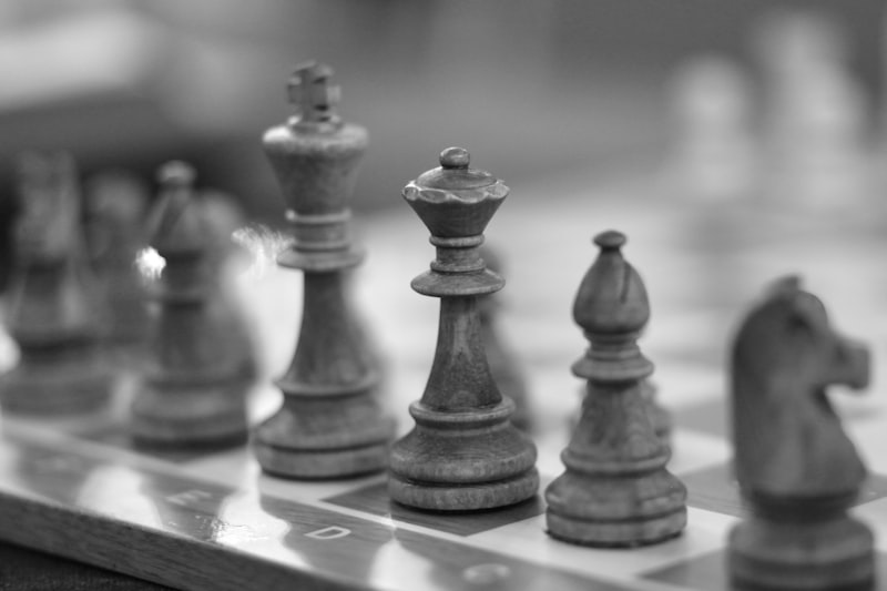 a close up of a set of chess pieces