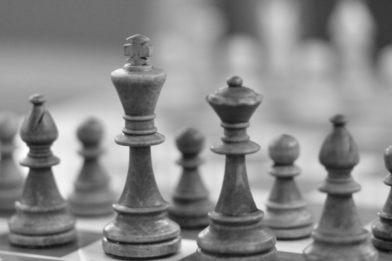 a black and white photo of a chess board