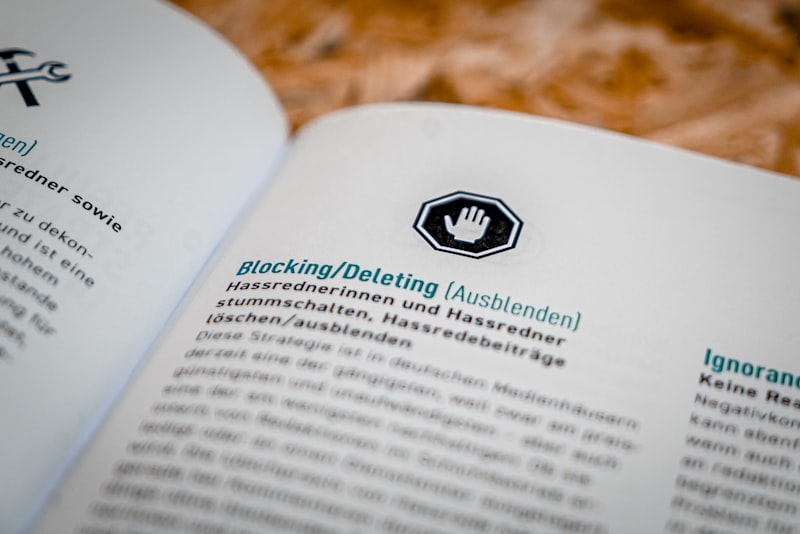 a close up of an open book on a table