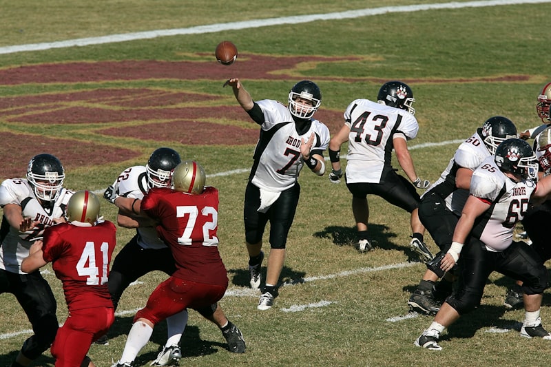 group of men playing football