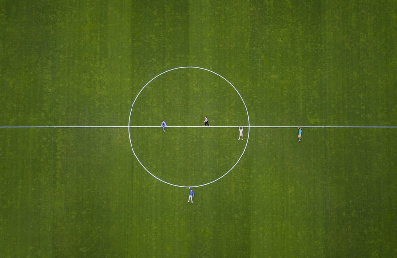 a group of people playing football