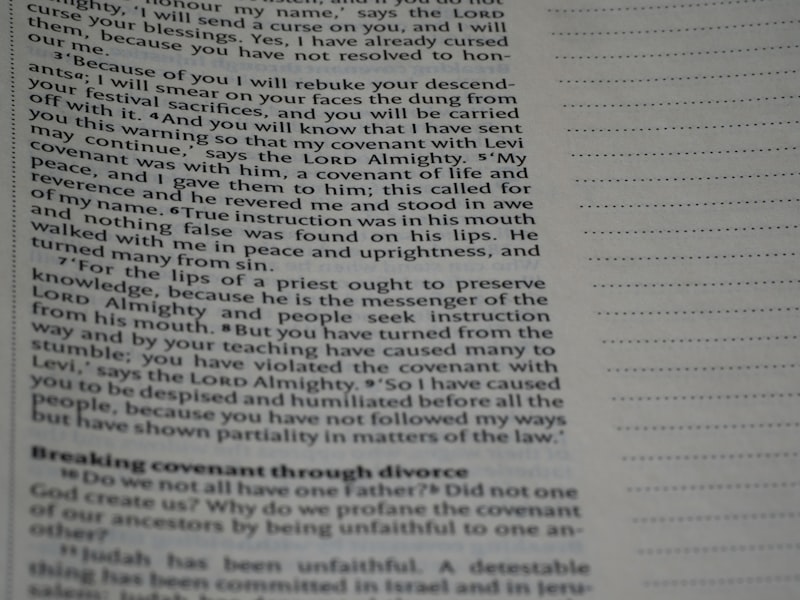 a close up of a book with a page in it