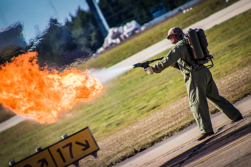 man holding flame thrower