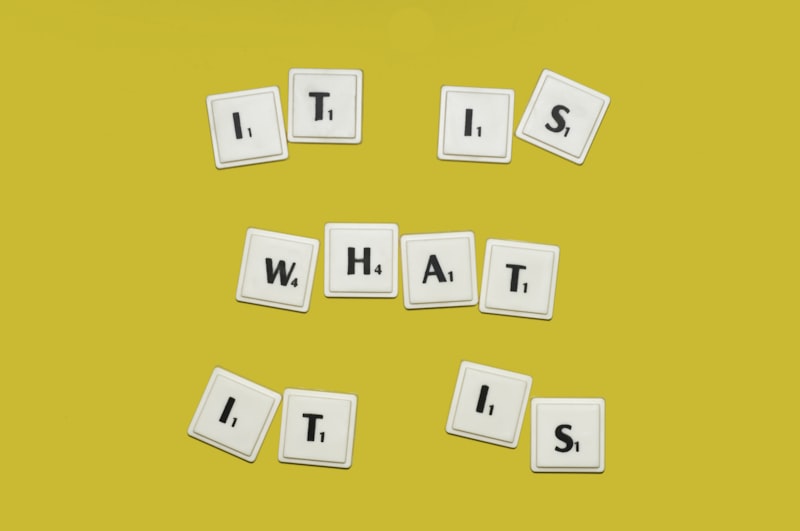 the words it's what it's spelled with small tiles